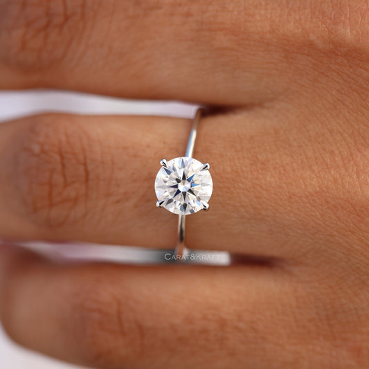 Round Cut Colorless Moissanite Solitaire Engagement Ring, view 1