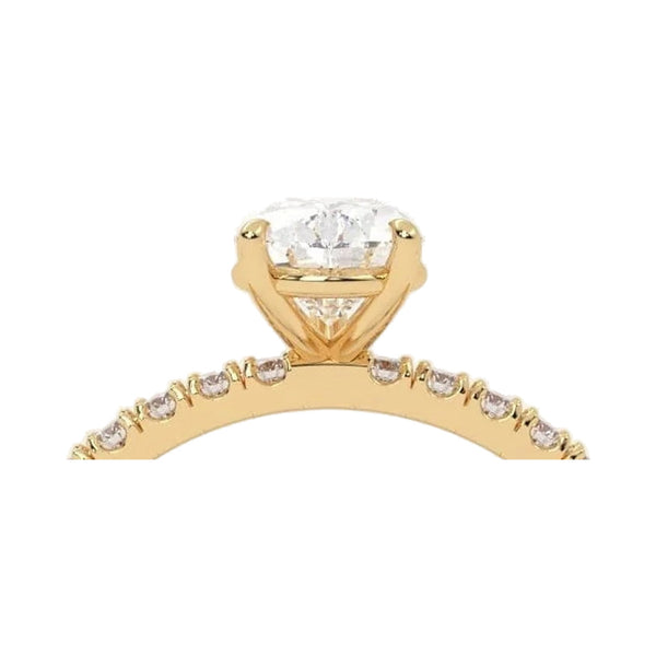 Pear Cut Moissanite Diamond Engagement Ring With Pave Setting from Carat and Kraft, on white