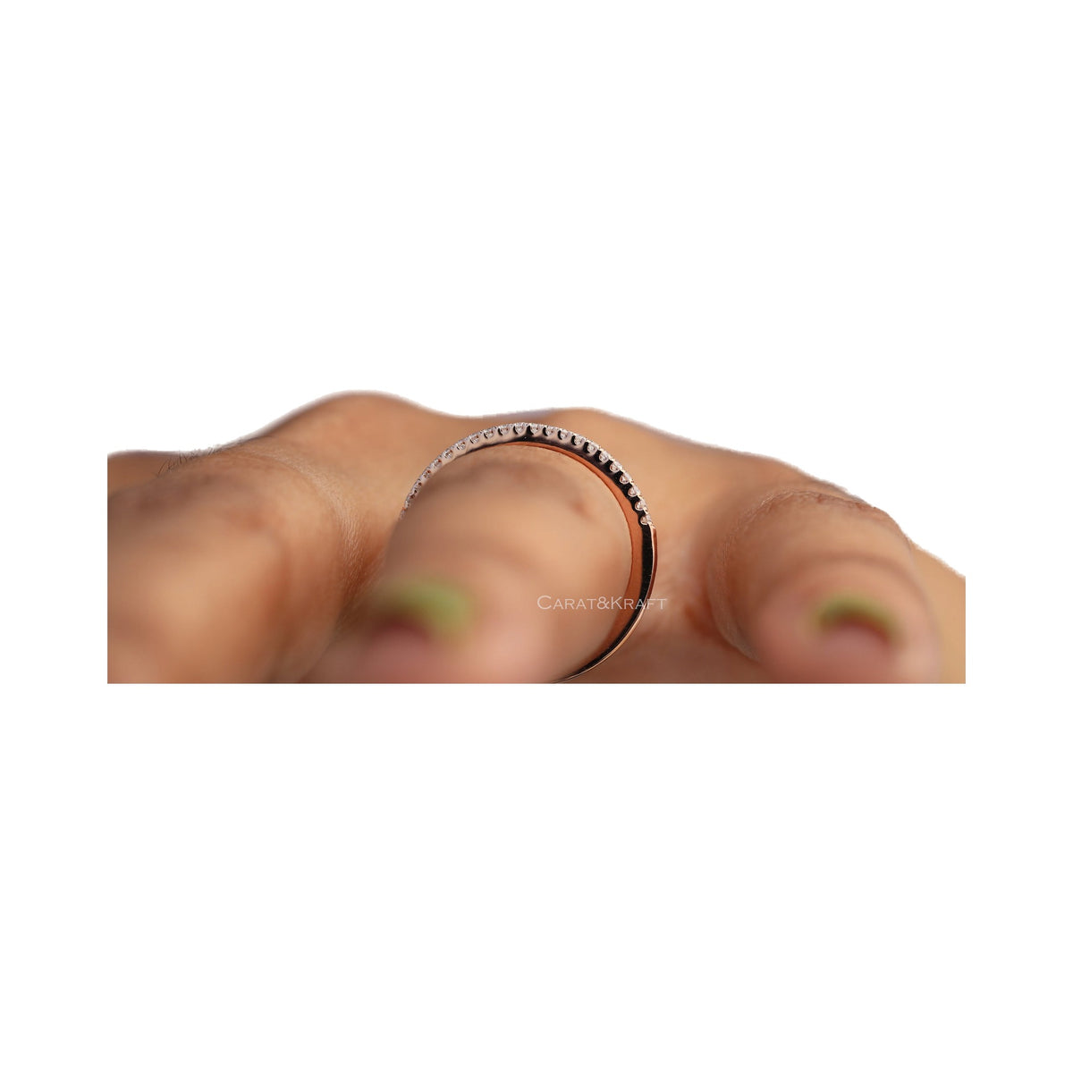 1.1mm Half Eternity Moissanite Wedding Band from Carat and Kraft, on white