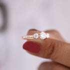 Round Cut Three Stone Side Accent Engagement Ring