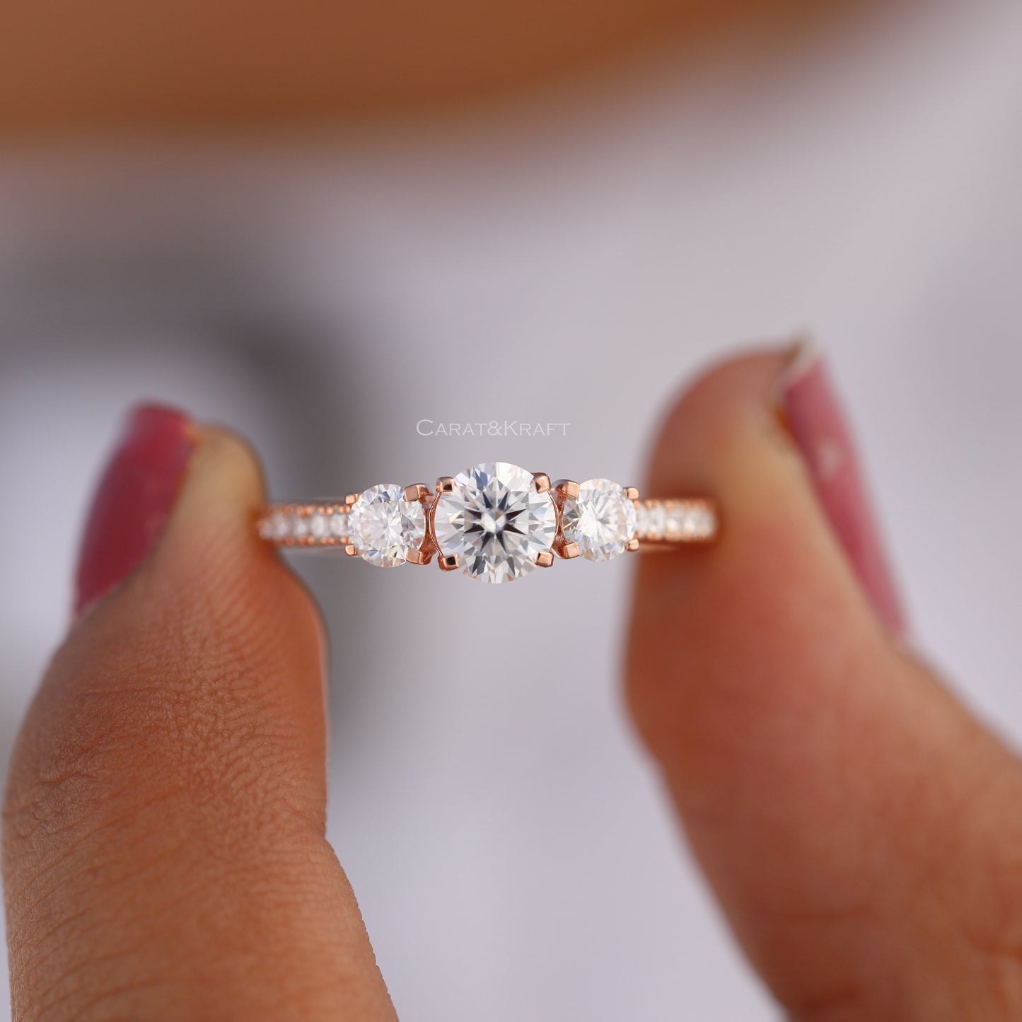 Round Cut Three Stone Side Accent Engagement Ring