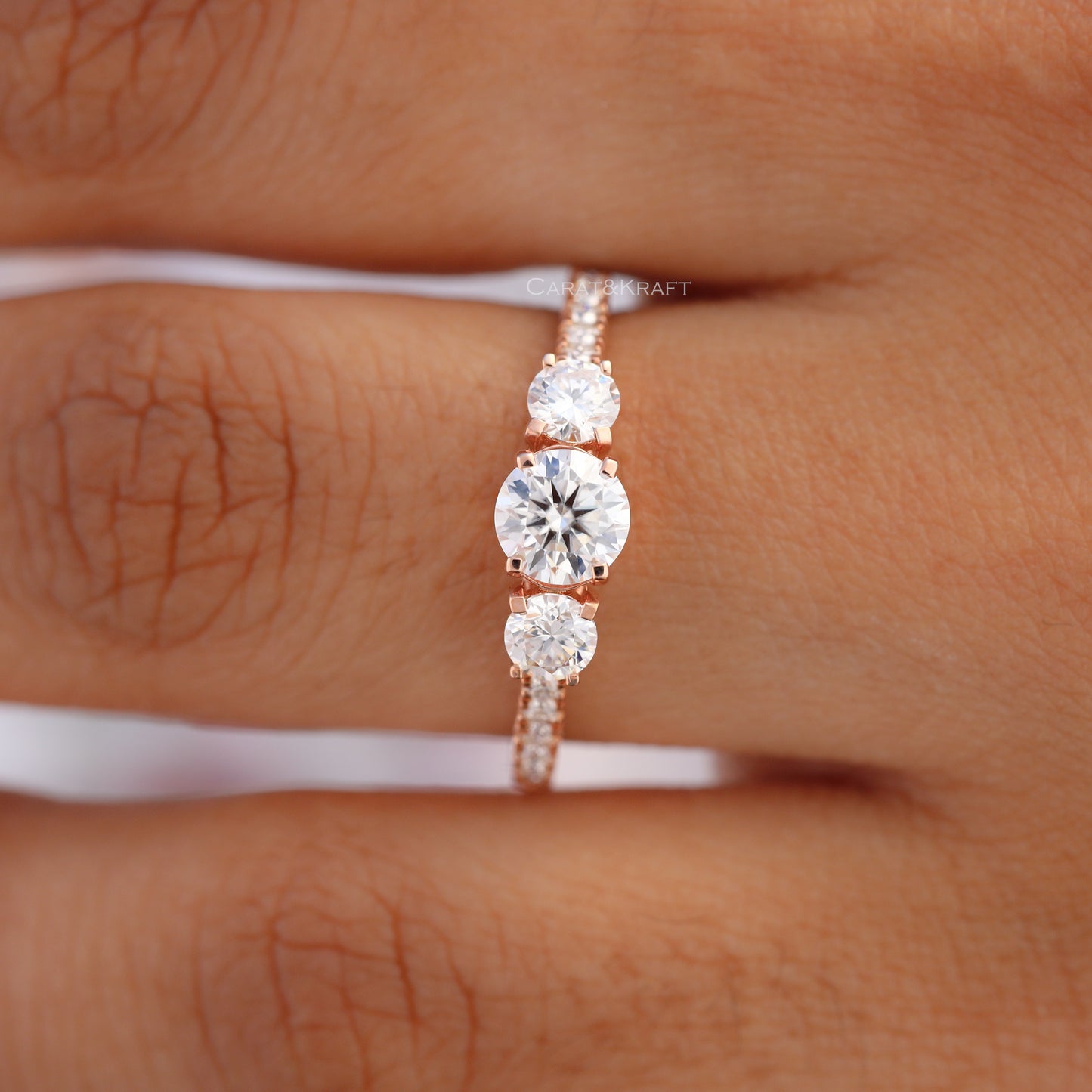 Round Cut Three Stone Side Accent Engagement Ring