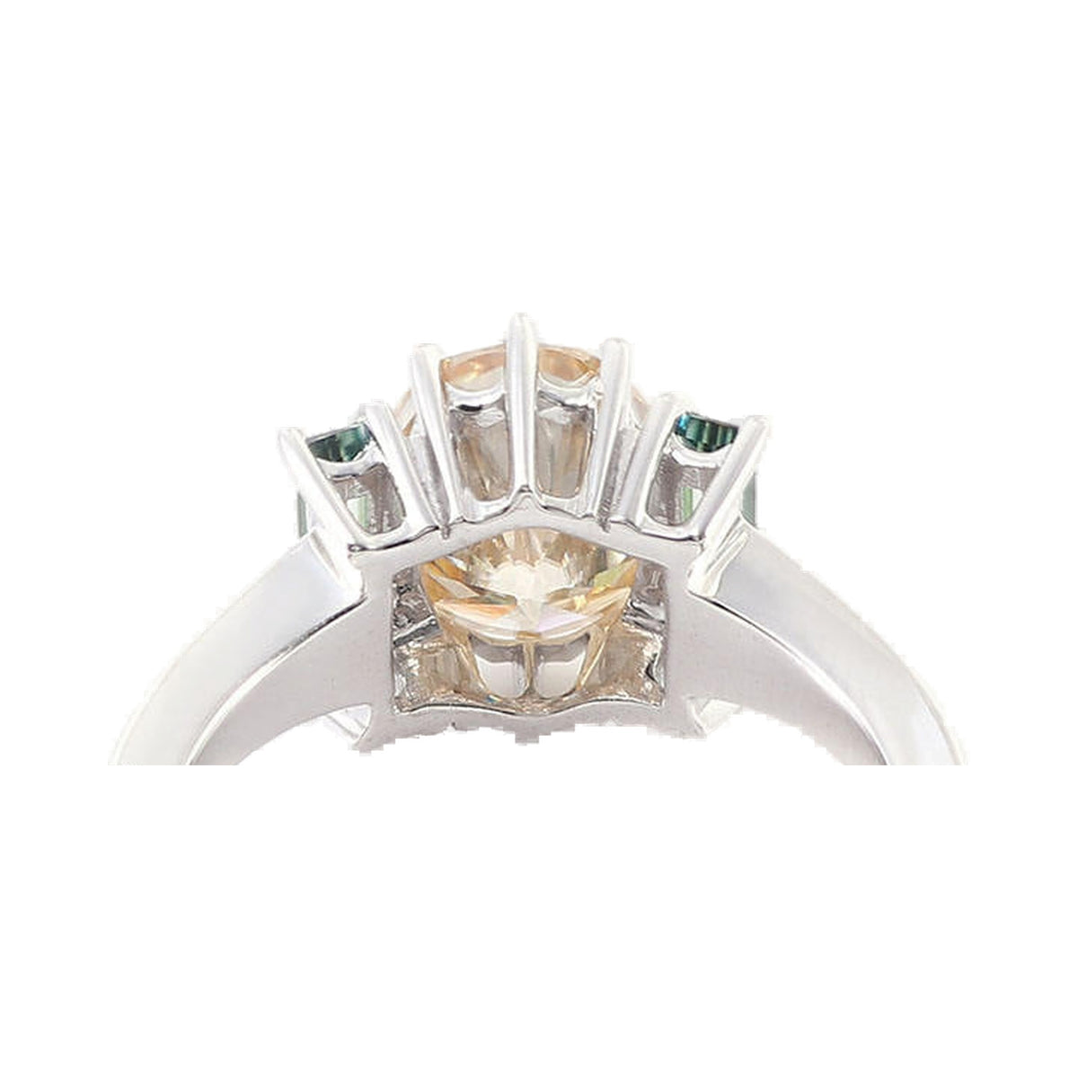 Champagne Oval & Light Green Emerald Three Stone Moissanite Ring from Carat and Kraft, on white