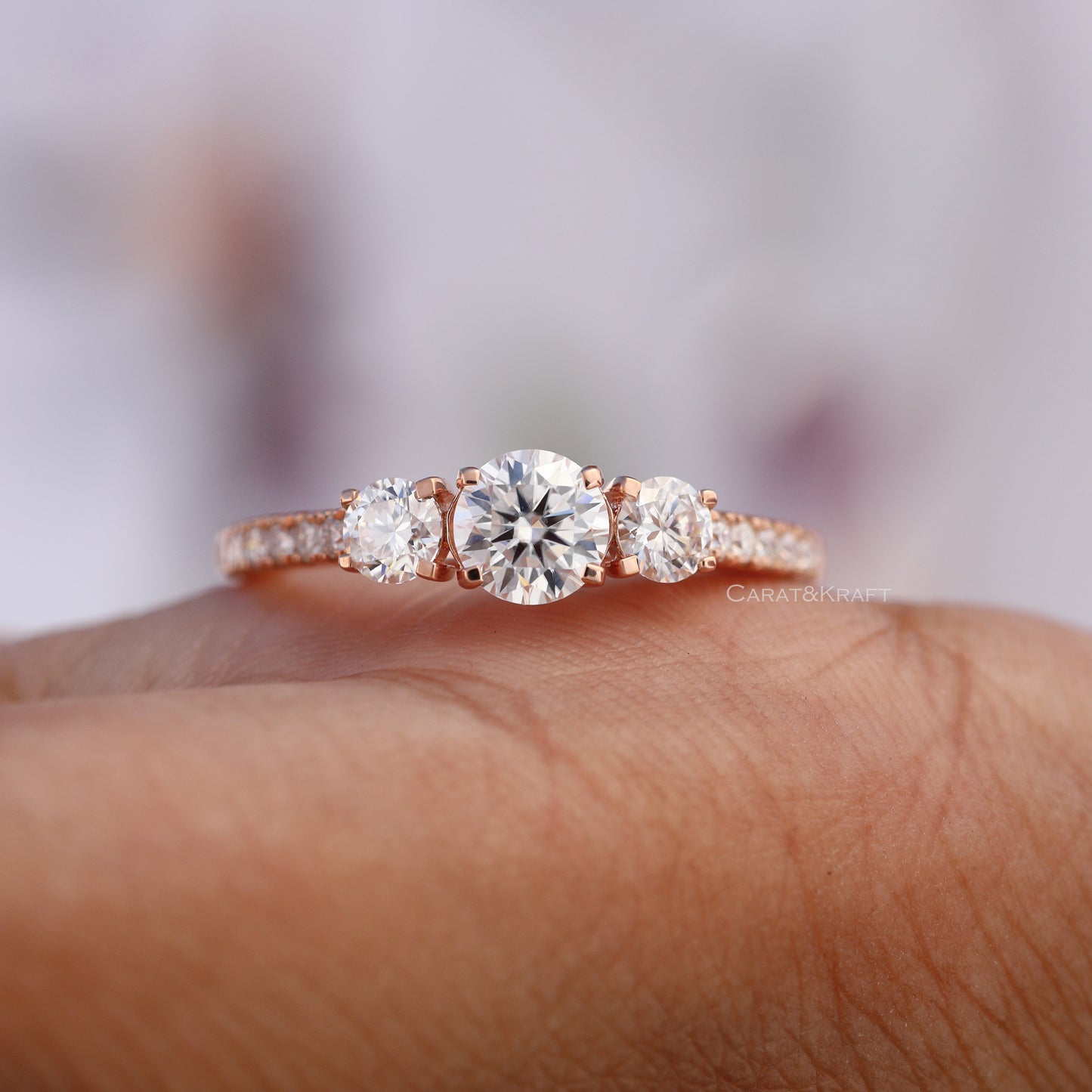 Round Cut Three Stone Side Accent Engagement Ring