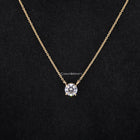 four claw prong diamond pendant