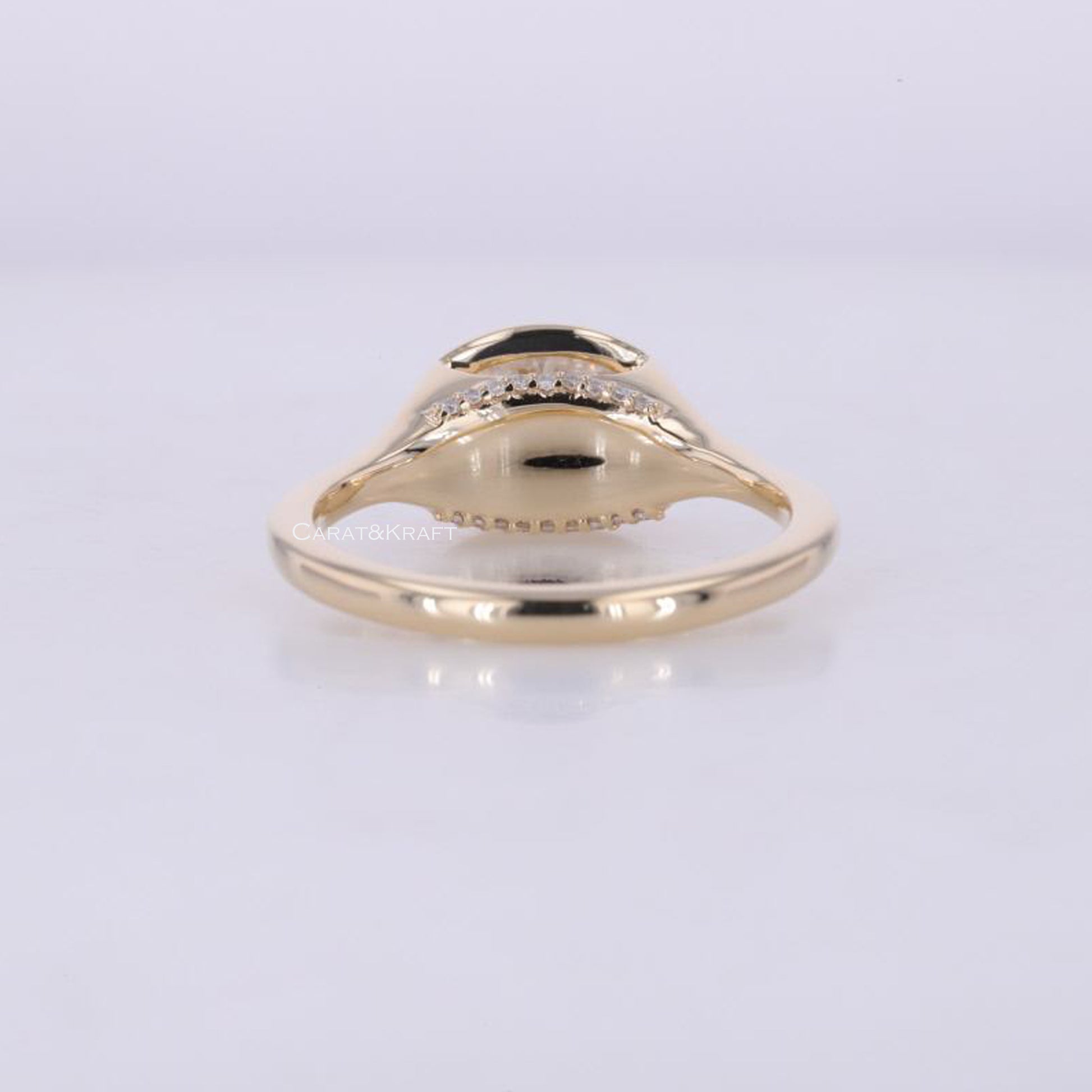 oval cut bezel set solitaire wedding ring