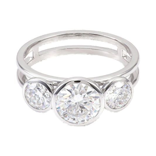 Round Moissanite Diamond Three Stone Bezel Set Ring from Carat and Kraft, on white