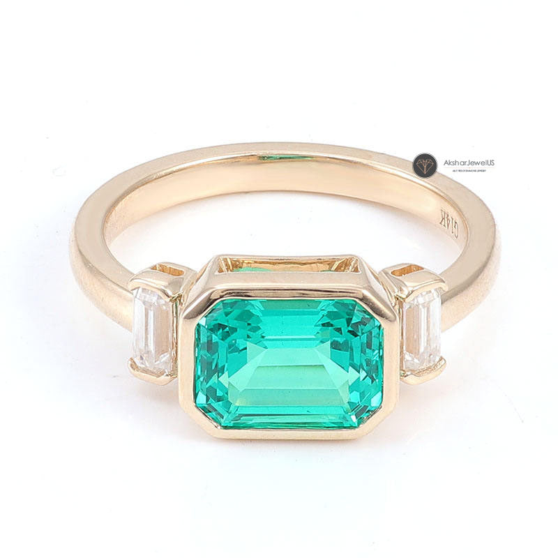 Green Emerald Cut Three Stone Half Bezel Set Moissanite East West Ring