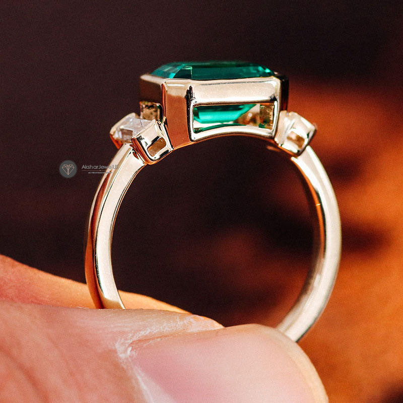 Green Emerald Cut Three Stone Half Bezel Set Moissanite East West Ring