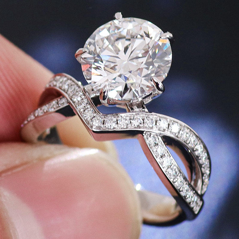 Round Cut Half Twist Crown Shape Engagement Ring