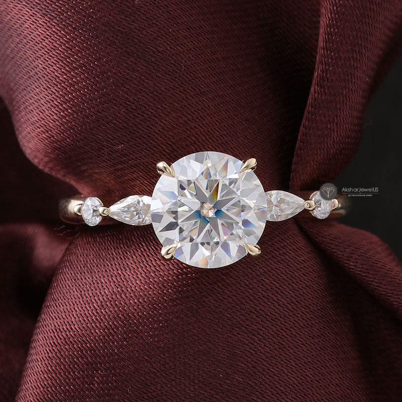 Round And Pear Cut Moissanite Engagement Ring