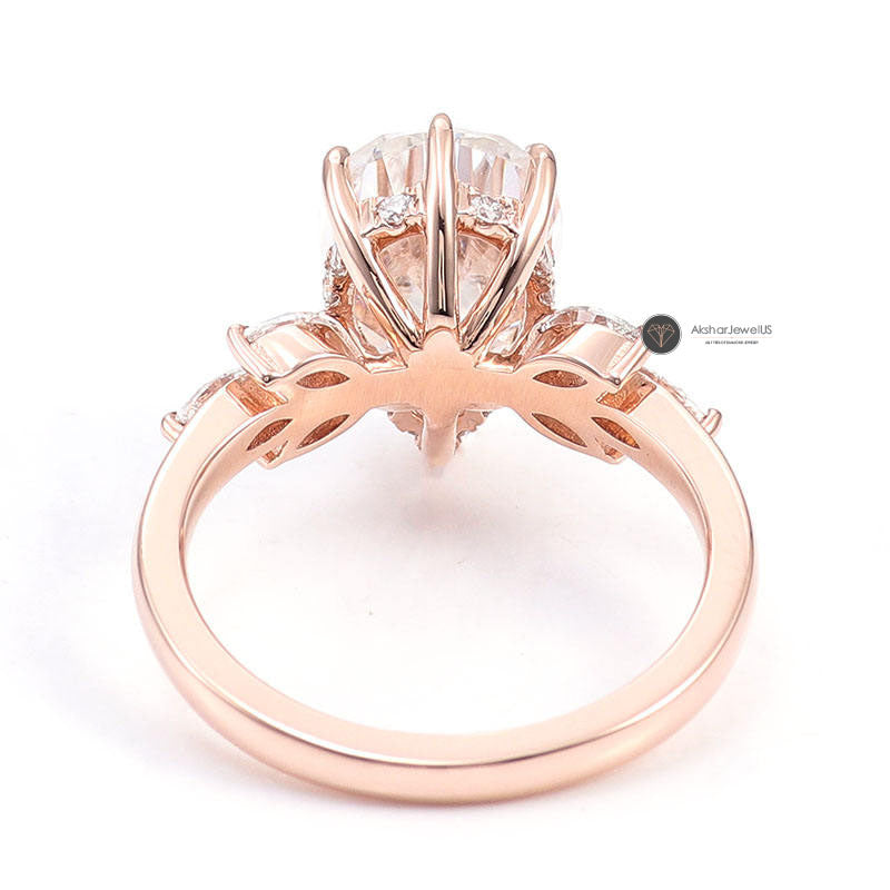 Pear Cut Hidden Halo With Side Accent Ring