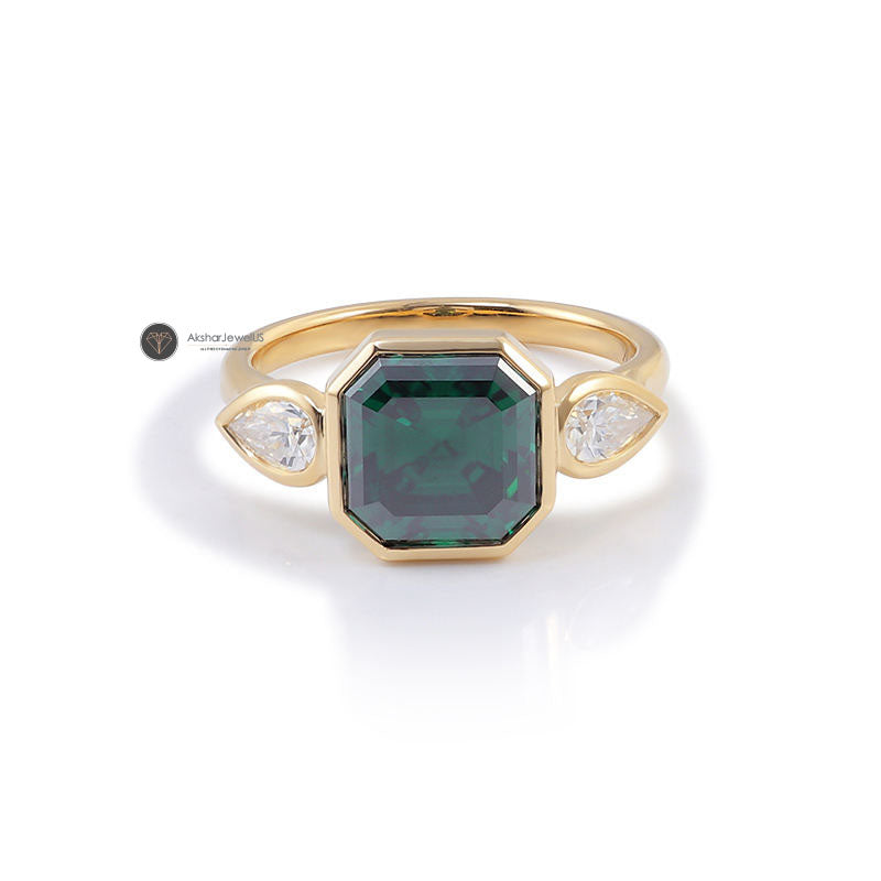 Green Emerald Asscher Moissanite Bezel Set and Pear Three Stone Ring