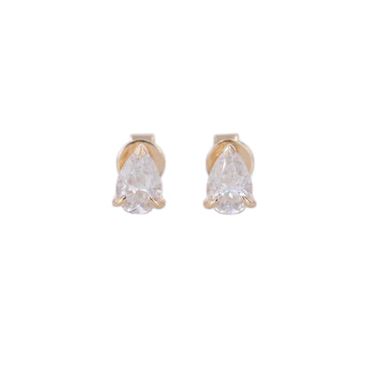 Pear cut lab grown diamond stud earrings in yellow gold