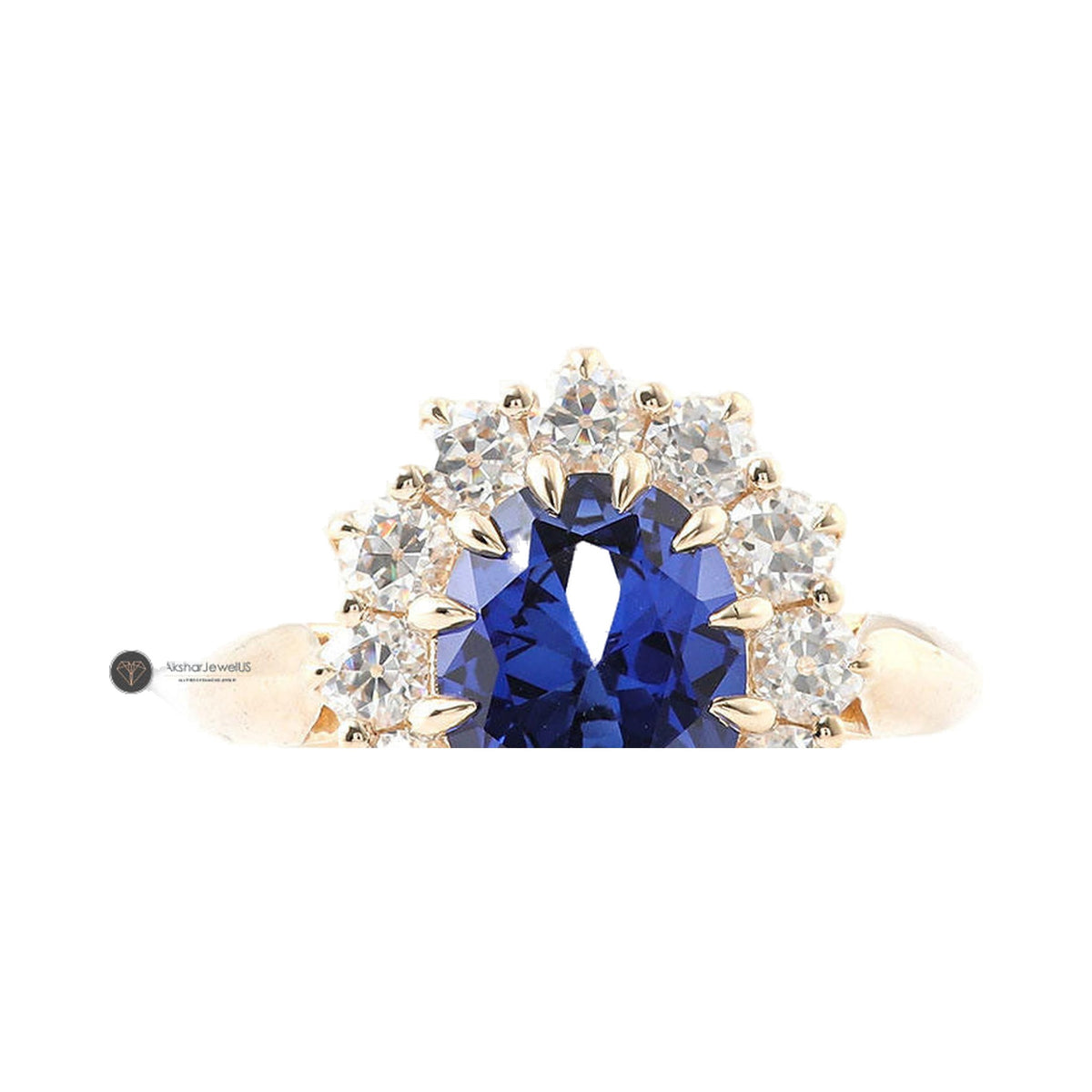 Blue Oval Moissanite Engagement Ring, Round Cluster Halo Flower Ring from Carat and Kraft, on white