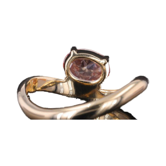 Oval Vivid Pink Moissanite Diamond Curved Ring from Carat and Kraft, on white