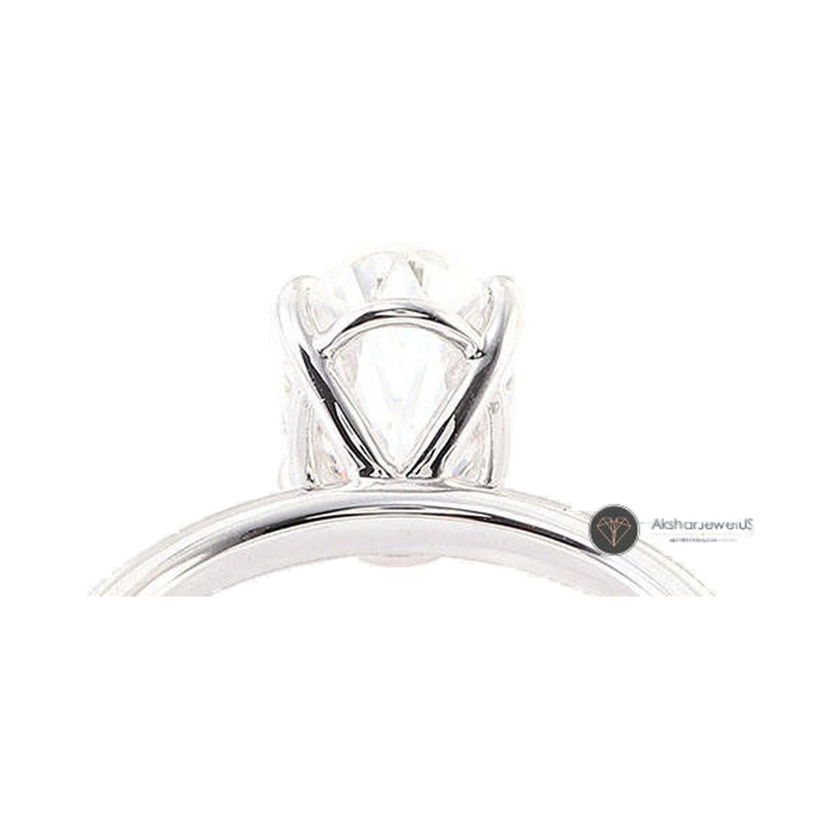 Elongated Crushed Ice Oval Cut Moissanite Solitaire Engagement Ring from Carat and Kraft, on white