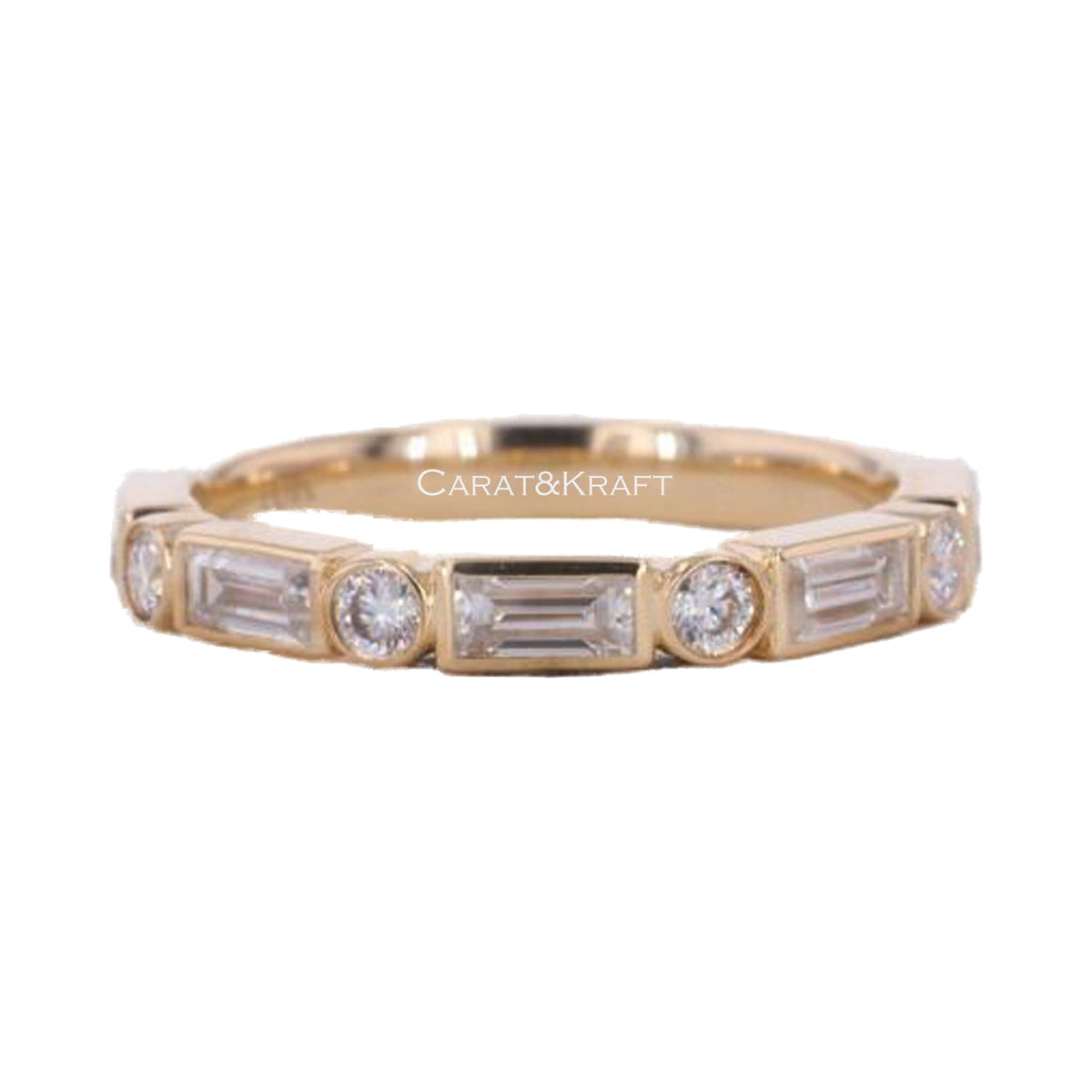 Emerald and Round Moissanite Diamond Wedding Band from Carat and Kraft, on white