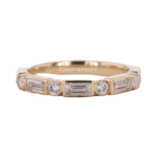 Emerald and Round Moissanite Diamond Wedding Band from Carat and Kraft, on white