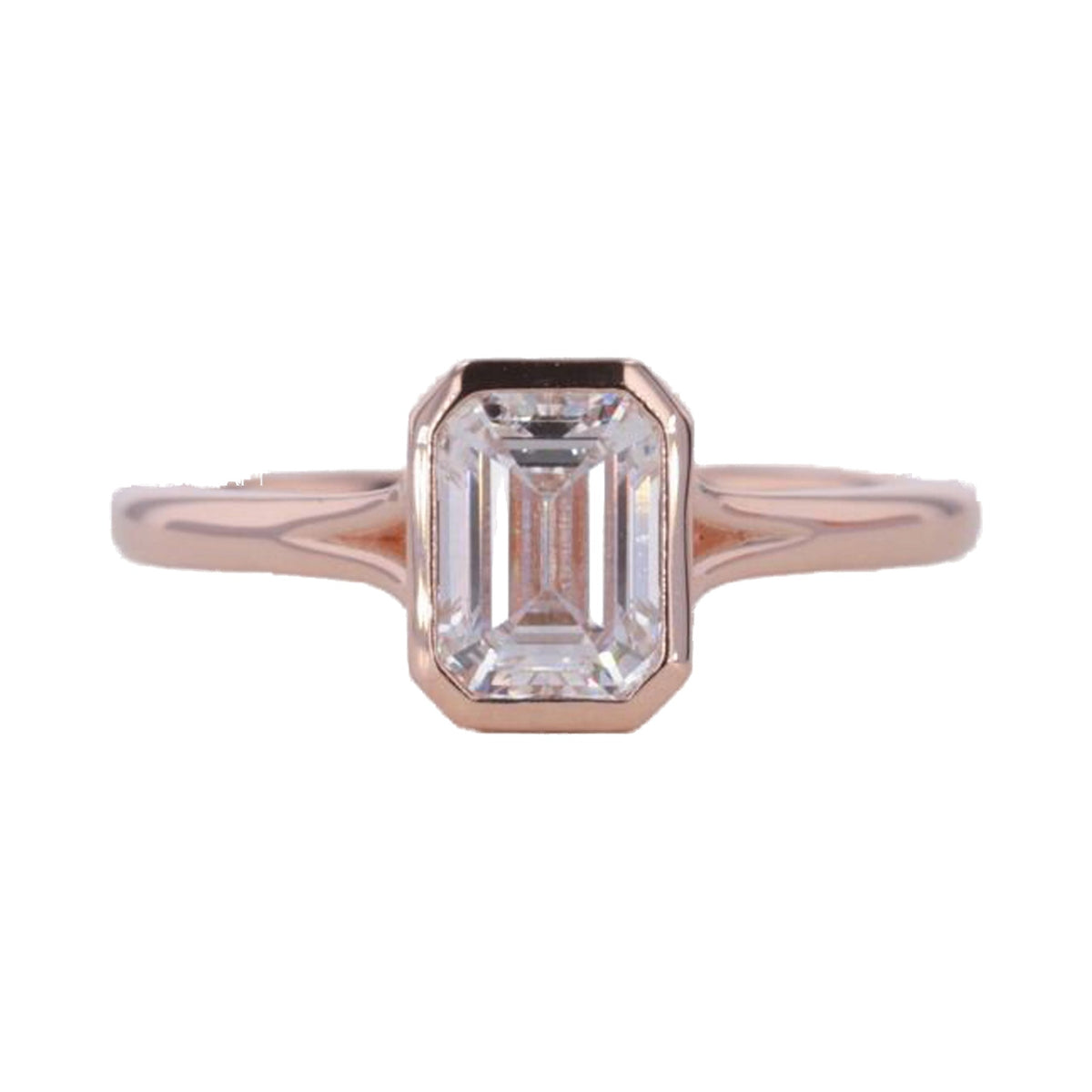 Emerald Cut Bezel Set Moissanite Engagement Ring from Carat and Kraft, on white
