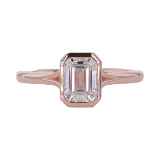 Emerald Cut Bezel Set Moissanite Engagement Ring from Carat and Kraft, on white