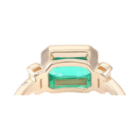 Green Emerald Cut Three Stone Half Bezel Set Moissanite East West Ring from Carat and Kraft, on white