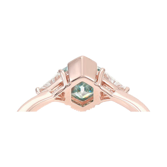 Green Hexagon Half Bezel Set Three Stone Moissanite Ring from Carat and Kraft, on white
