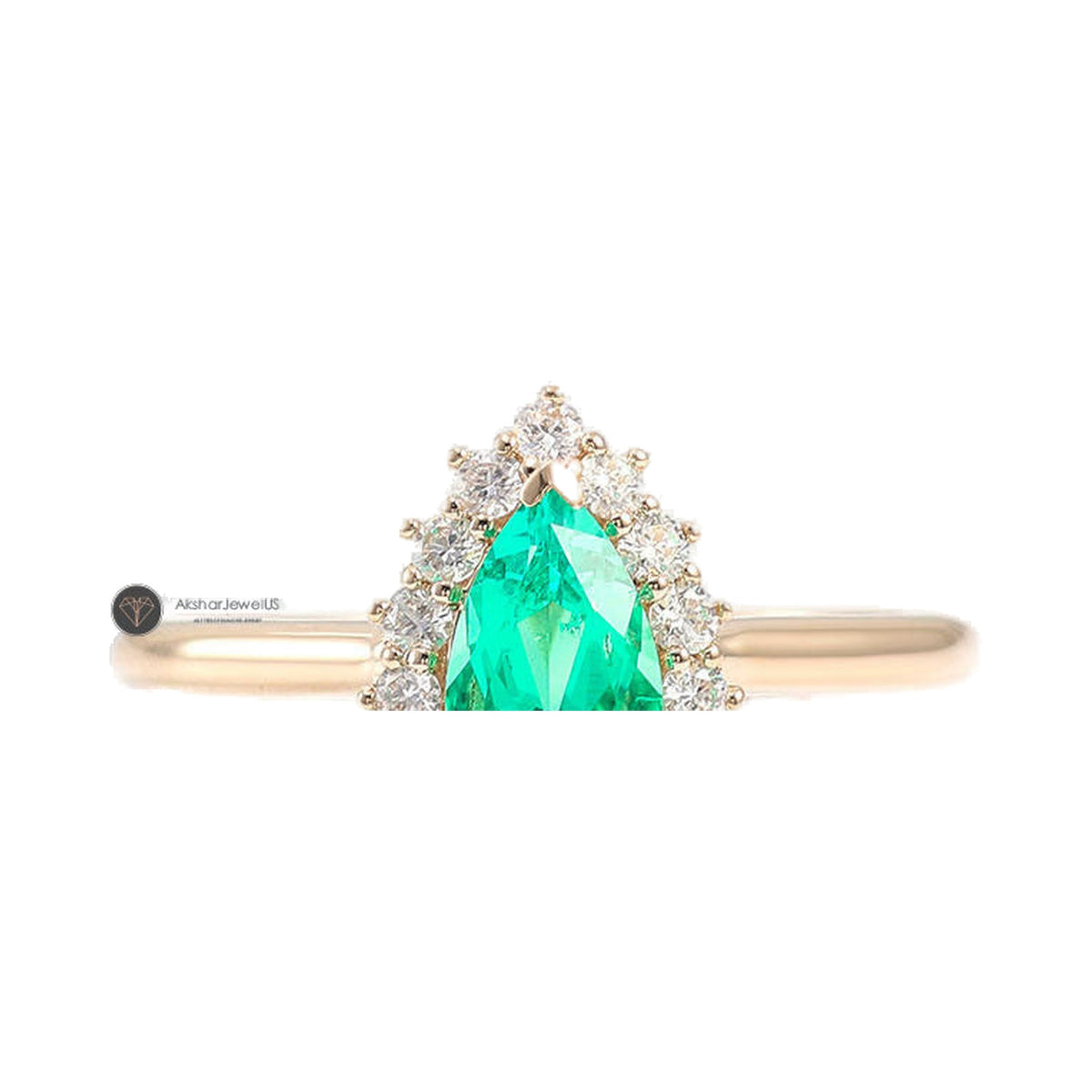 Green Pear Cut Moissanite Halo Flower Shape Halo Engagement Ring from Carat and Kraft, on white