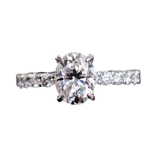 Oval Cut U Prong Hidden Halo Moissanite Engagement Ring from Carat and Kraft, on white
