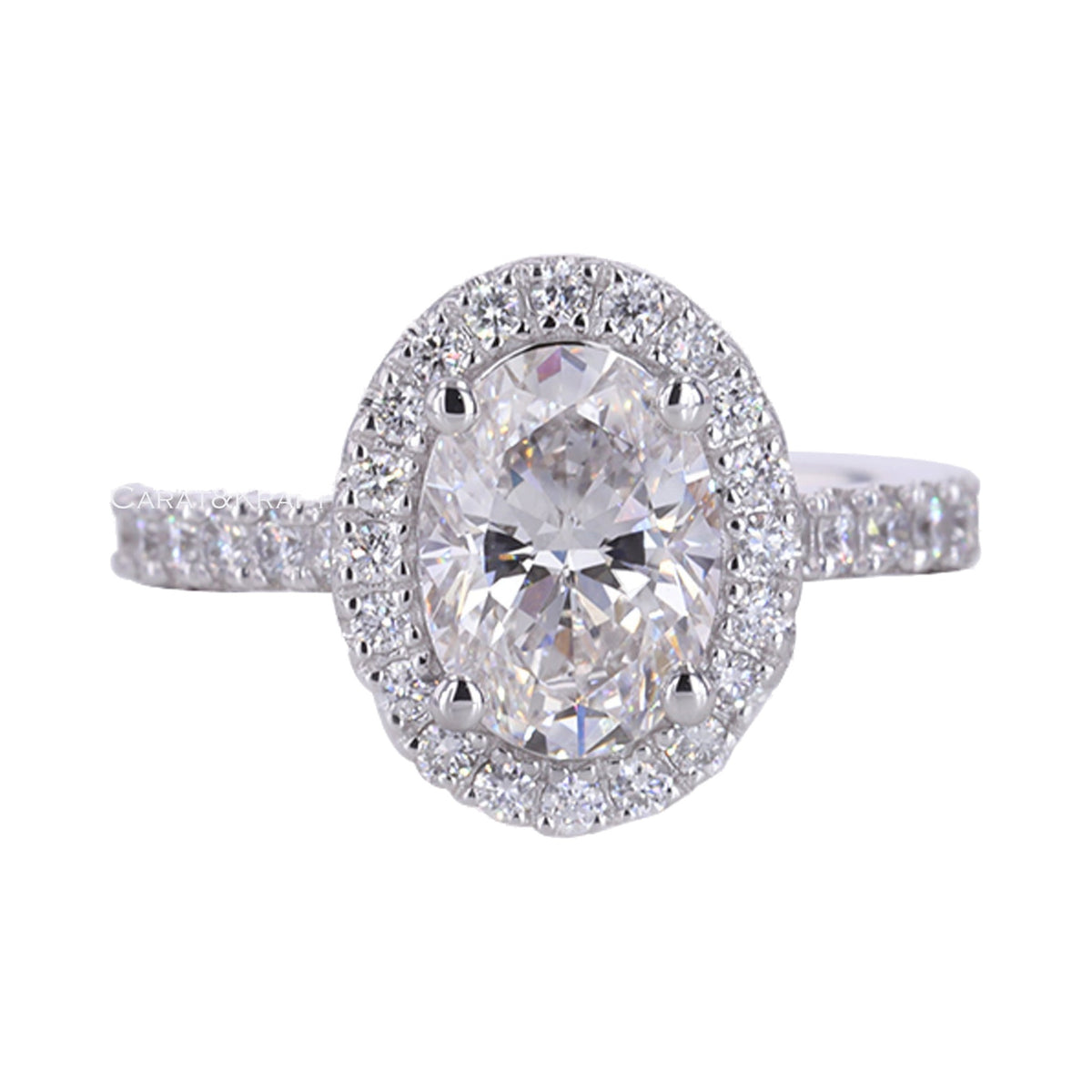 Oval cut Halo Pave Set Moissanite Engagement Ring from Carat and Kraft, on white