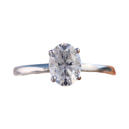 1.0 CT To 5.0 CT Oval Cut Moissanite Diamond Solitaire Engagement Ring from Carat and Kraft, on white