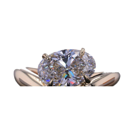 Oval Cut Lab Grown Diamond Wave Diamond Ring from Carat and Kraft, on white
