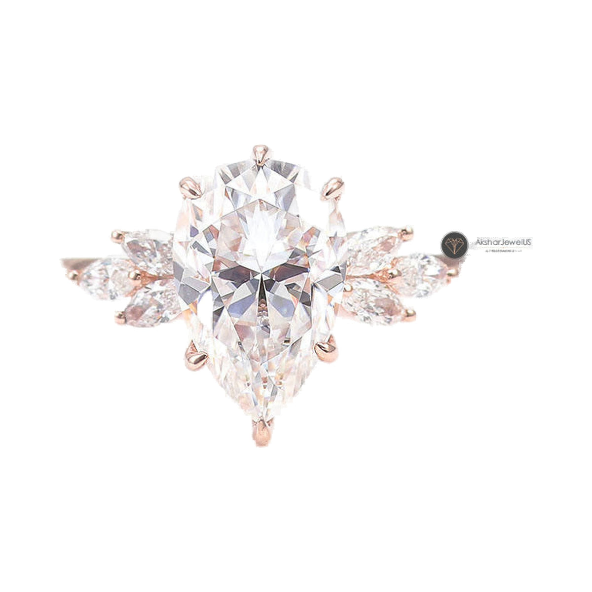 Pear Cut Hidden Halo With Side Accent Ring from Carat and Kraft, on white