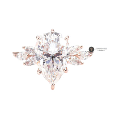 Pear Cut Hidden Halo With Side Accent Ring from Carat and Kraft, on white