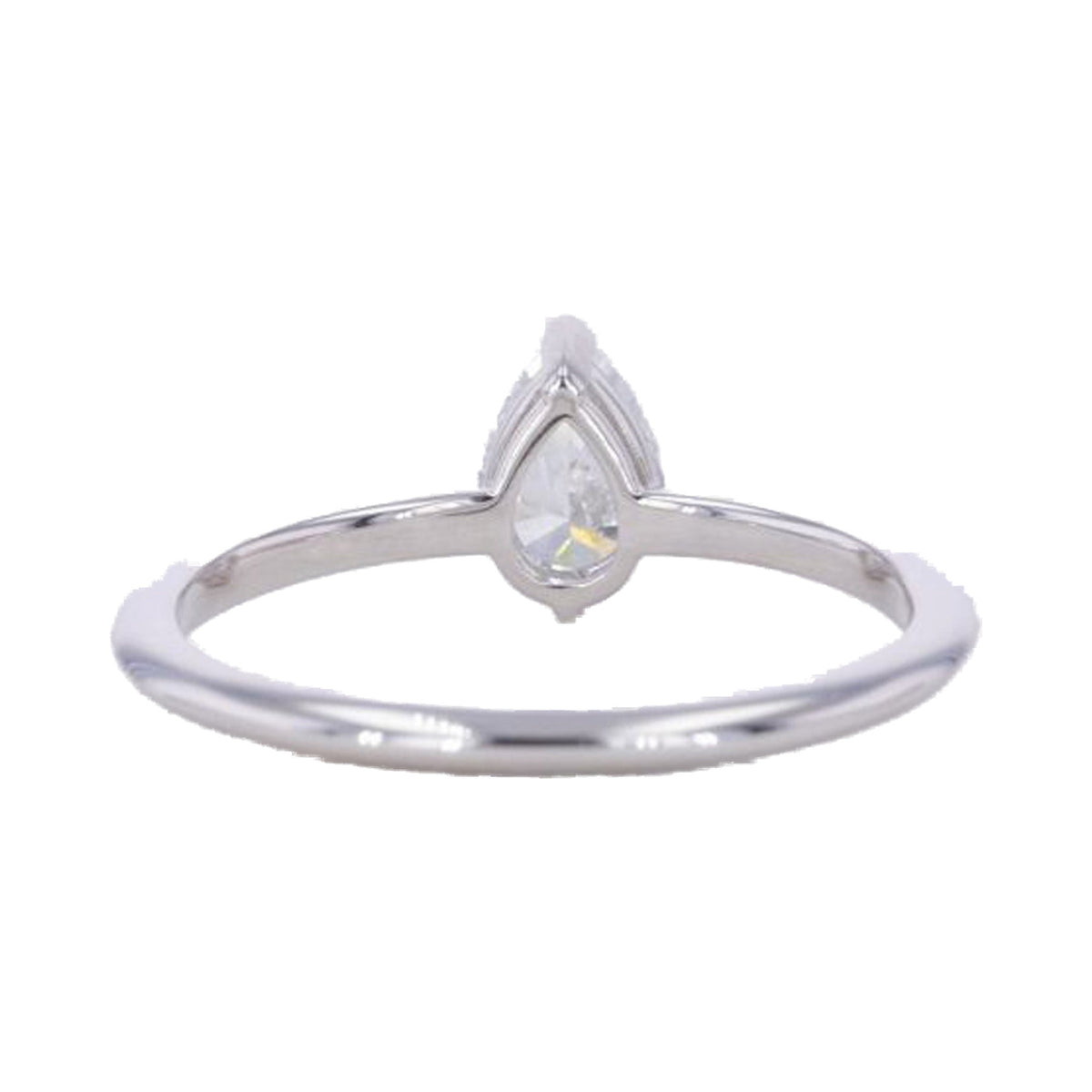 Pear Cut Moissanite Diamond Engagement Ring from Carat and Kraft, on white