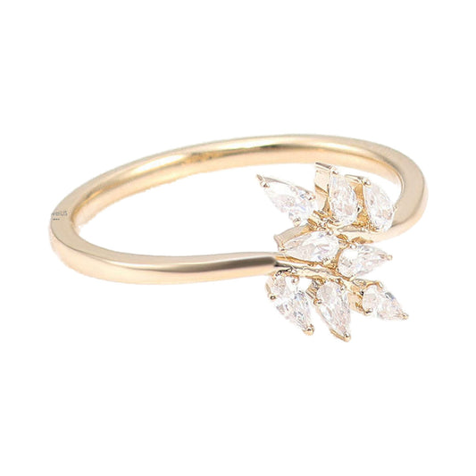 Pear Lab Diamond Bypass Shank Style Moissanite Floral wedding band from Carat and Kraft, on white