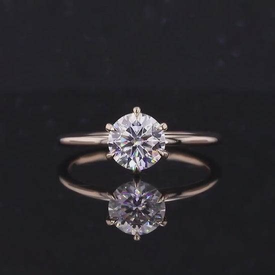 round cut solitaire engagement ring for her