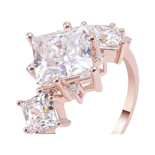 Princess Cut Moissanite Diamond Three Stone Diamond ring from Carat and Kraft, on white