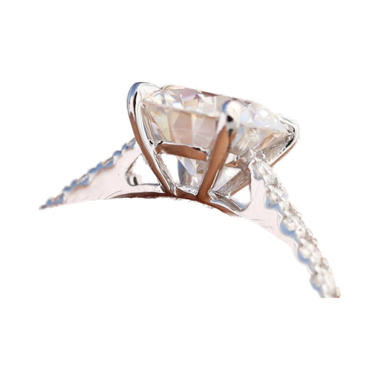 Round Brilliant Cut Moissanite Ring, Claw Prongs Pave Set Ring from Carat and Kraft, on white