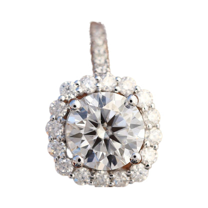 Round Cut Halo Moissanite Engagement Ring from Carat and Kraft, on white