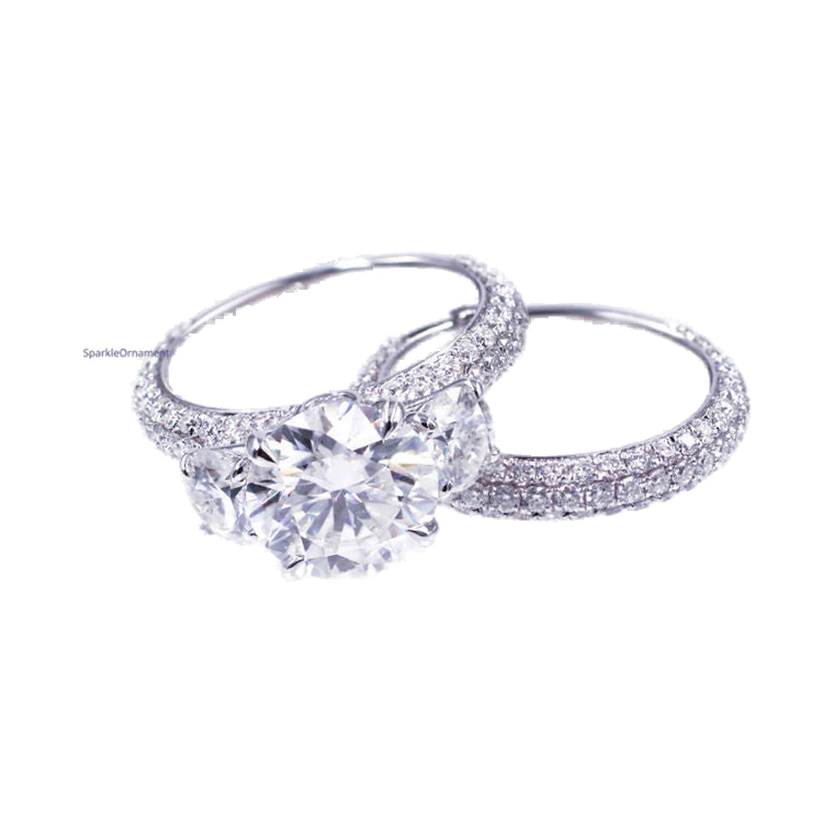 Round Moissanite Three Stone Pave Set Ring Set from Carat and Kraft, on white