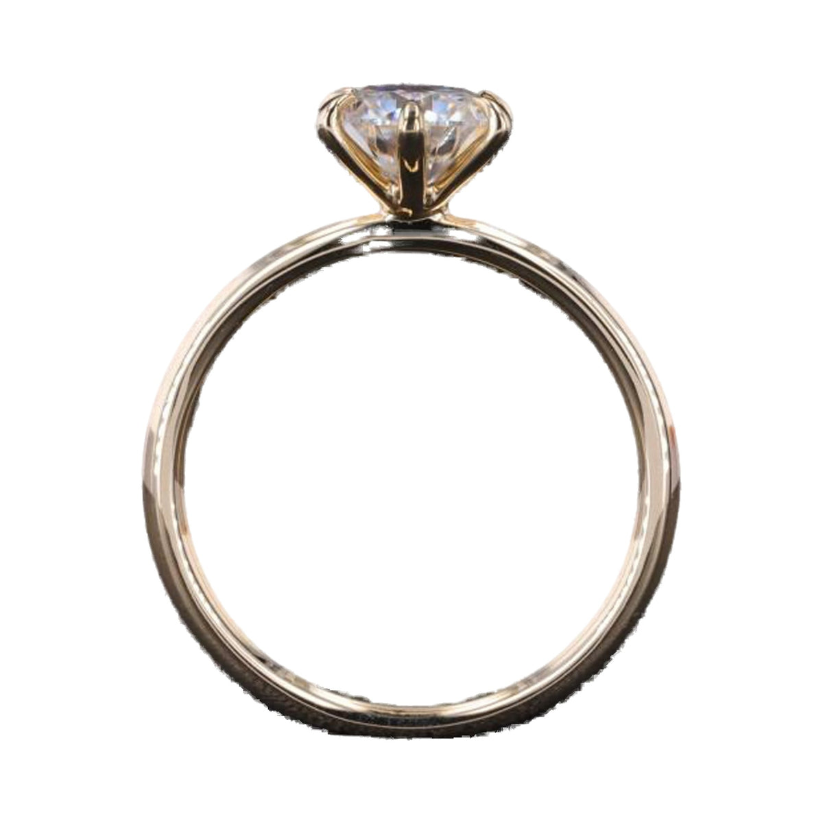 Round Solitaire Claw Prong Moissanite Diamond Engagement Ring from Carat and Kraft, on white