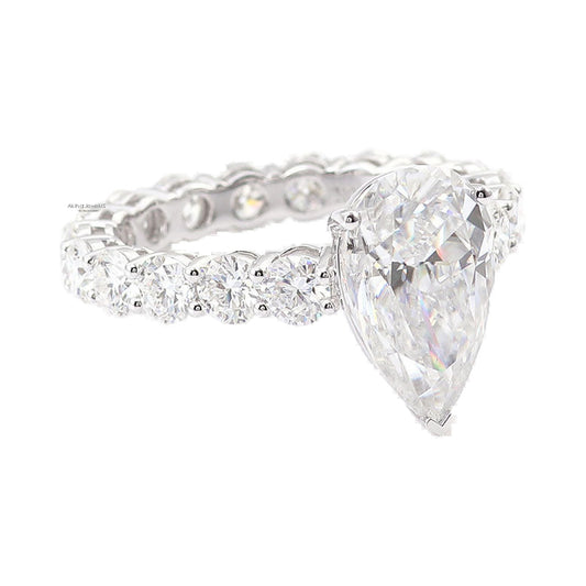 Pear Cut Lab Grown Diamond Engagement Ring Side Stone Moissanite Ring from Carat and Kraft, on white