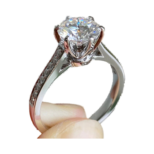 Round Cut Moissanite Solitaire Engagement Ring from Carat and Kraft, on white