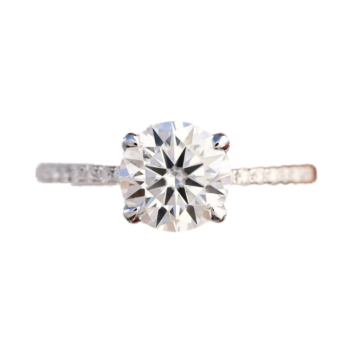 Round Moissanite Pave Engagement Ring from Carat and Kraft, on white