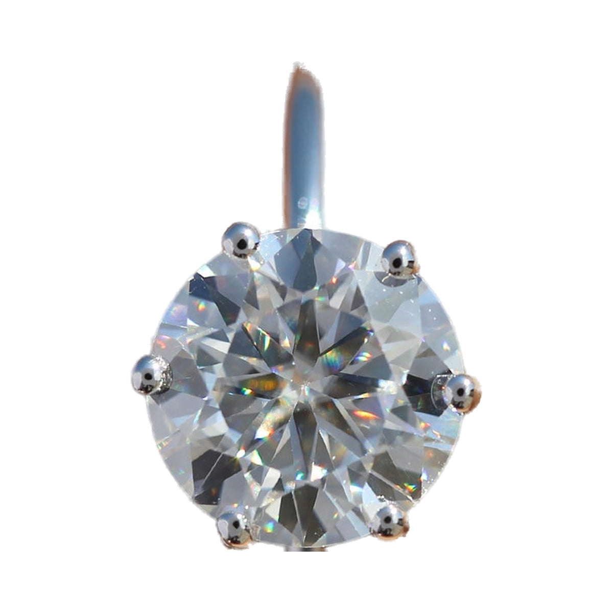 Round Cut Moissanite Solitaire Engagement Ring from Carat and Kraft, on white