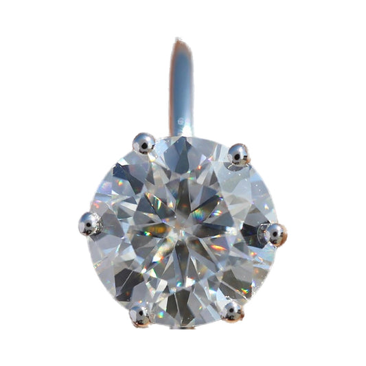 Round Cut Moissanite Solitaire Engagement Ring from Carat and Kraft, on white