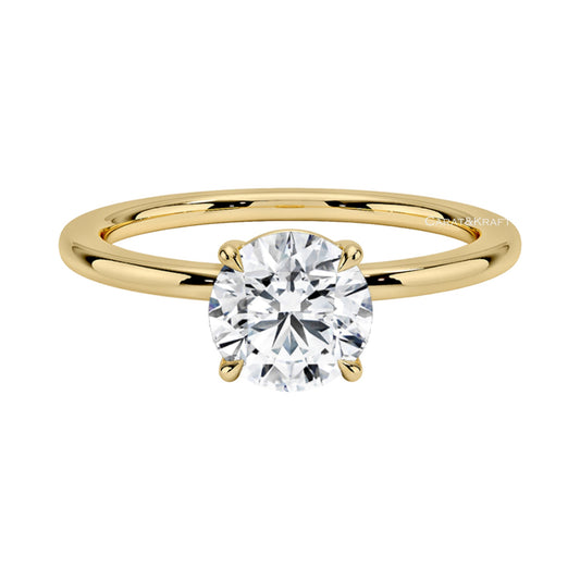 Round Moissanite Diamond Solitaire Engagement Ring from Carat and Kraft, on white