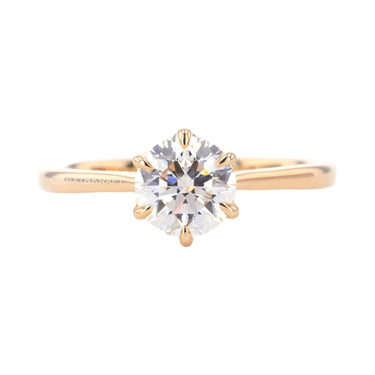 Round Cut Solitaire Moissanite Diamond Engagement Ring from Carat and Kraft, on white