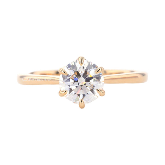 Round Cut Solitaire Moissanite Diamond Engagement Ring from Carat and Kraft, on white